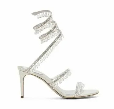 Elegant Moraima Snc White Leather Sandals - Summer High Heels with Crystal Tassels & Snake Pattern"