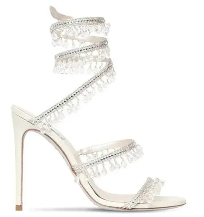 Elegant Moraima Snc White Leather Sandals - Summer High Heels with Crystal Tassels & Snake Pattern"